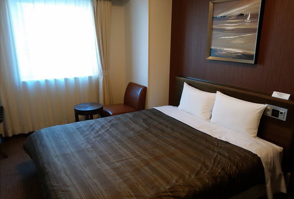 Hotel Route-Inn Chitose Ekimae Bagian luar foto
